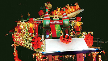 Decorated boat roof with Santa, reindeer and sleigh