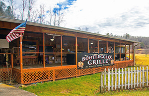 Front screened-in porch of Bootleggers Grille