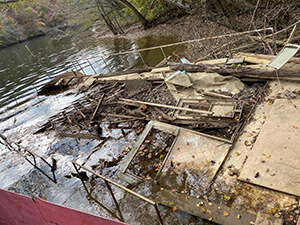 remnants of steel-hulled boat removed from lake