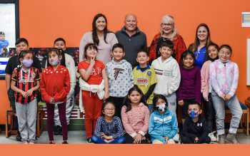 Jessica and Dale Ozaki with Lanier Partners (back row, left), visited the Joseph F. Walters Club recently. Also pictured (back row, right): Brenda Bohn, Development & Communications Director for the clubs and Walters Club Site Director Ari Guzman, along with lots of club kids.