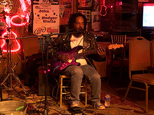 Guitarist, Lucious Spiller playing at Red's Blues Club