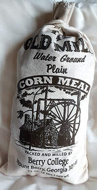 A cloth bag of "real" corn meal from Berry College produced by an "overshot" wheel