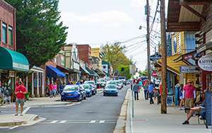 Blue Ridge streets and sidewalks with cars and people.