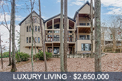 The back view of 3-story 2.65 million home on Lake Lanier