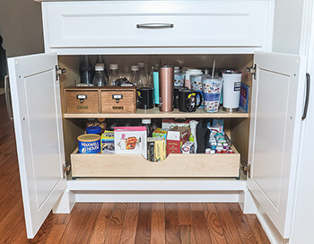 Open lower cabinet with new slide out shelving