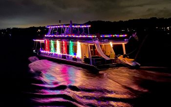 Houseboat with Christmas lights on Lake Lanier.