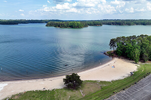 A view of Mary Alice Park showing the beach area and the lake.