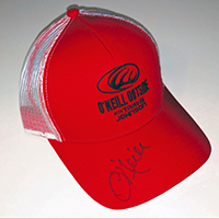 Red cap, signed by O'Neill Williams