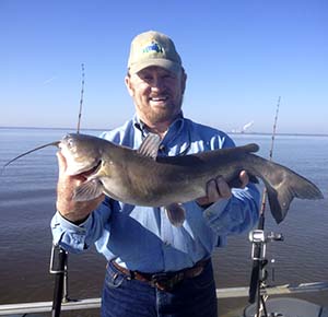 O'Neill Williams holding a large catfish. 