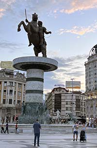 The central square in Skopje, North Macedonia with a statue of a man on a horse.