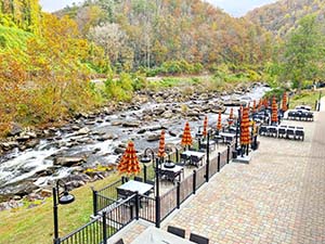 A view of the outside deck at the restaurant overlooking the Cheoah River. 
