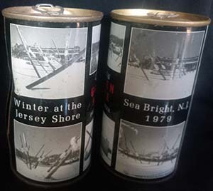 Two beer cans that have photos on them and text commemorating the Big Freeze of 1979.